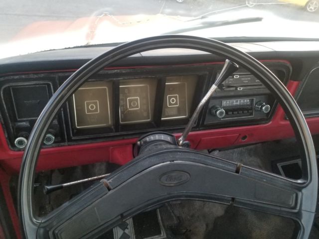 1973 red Ford F-100 Standard Cab Pickup