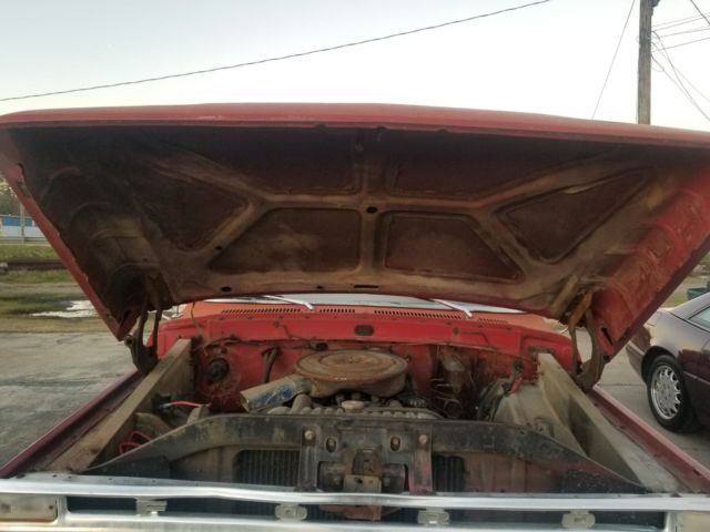 1973 red Ford F-100 Standard Cab Pickup