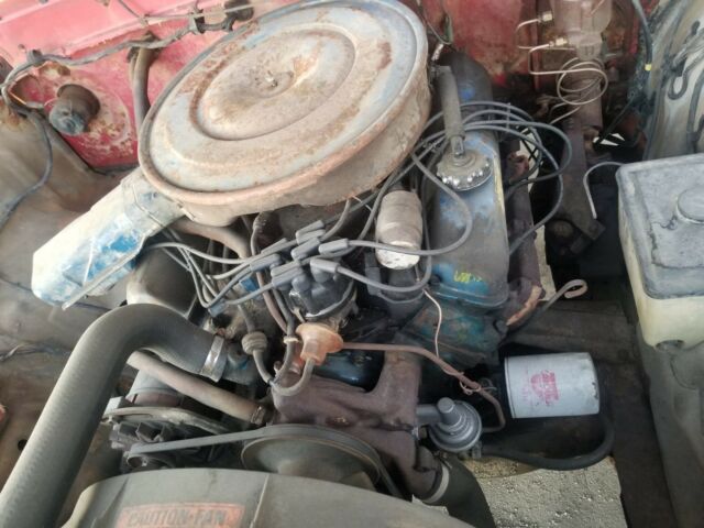 1973 red Ford F-100 Standard Cab Pickup