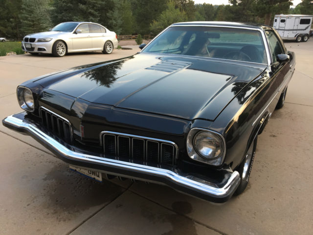 1973 Black Oldsmobile Cutlass Coupe