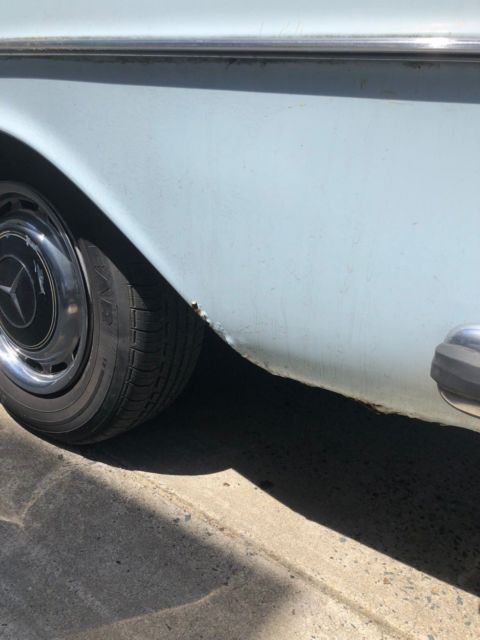 1973 Blue Mercedes-Benz 200-Series Sedan