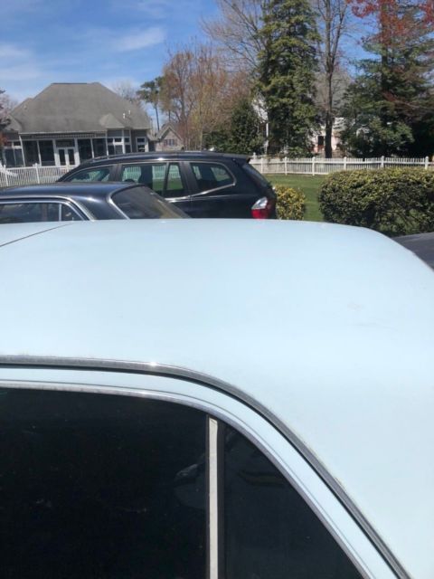 1973 Blue Mercedes-Benz 200-Series Sedan