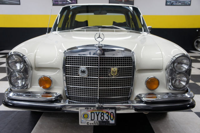 1973 White Mercedes-Benz 200-Series Sedan