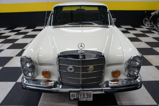 1973 White Mercedes-Benz 200-Series Sedan