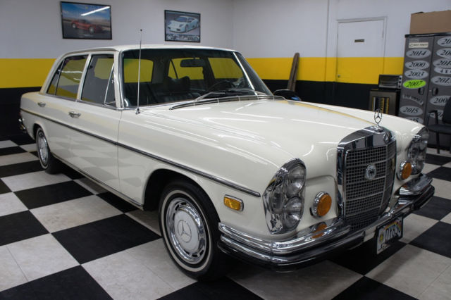 1973 White Mercedes-Benz 200-Series Sedan