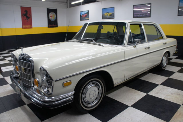 1973 White Mercedes-Benz 200-Series Sedan