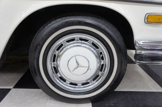 1973 White Mercedes-Benz 200-Series Sedan