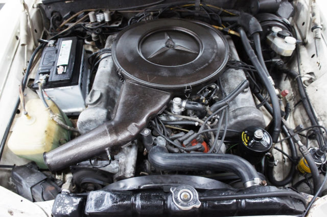 1973 White Mercedes-Benz 200-Series Sedan