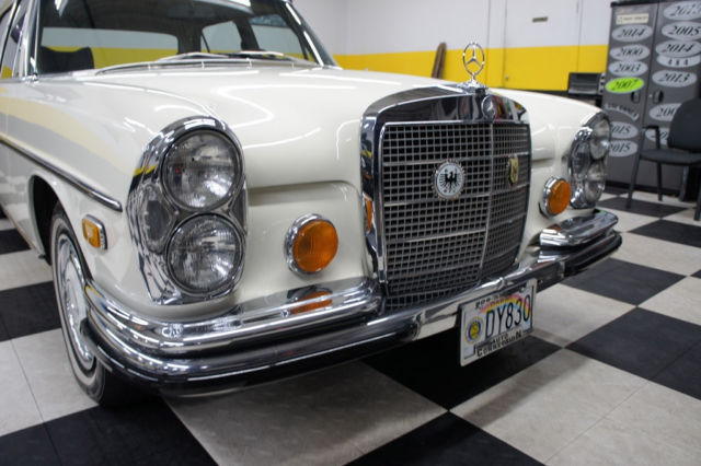 1973 White Mercedes-Benz 200-Series Sedan