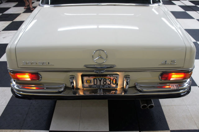 1973 White Mercedes-Benz 200-Series Sedan