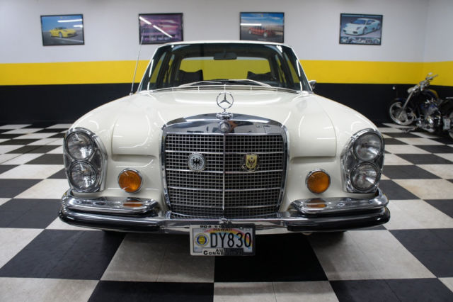 1973 White Mercedes-Benz 200-Series Sedan