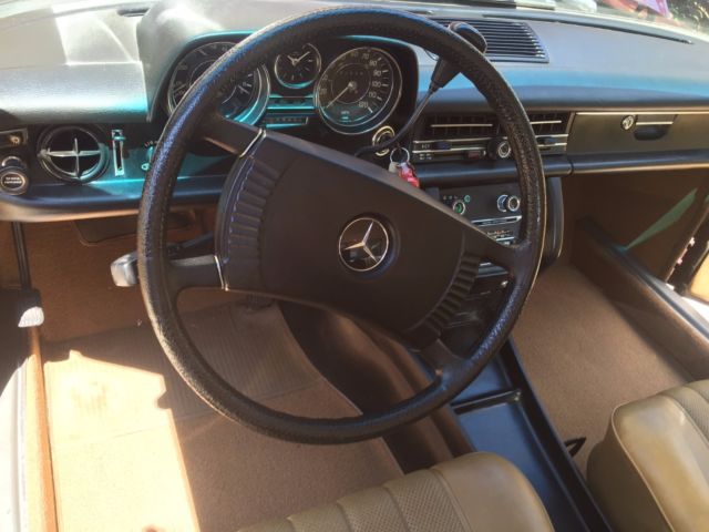 1973 Burgundy Mercedes-Benz 200-Series Sedan