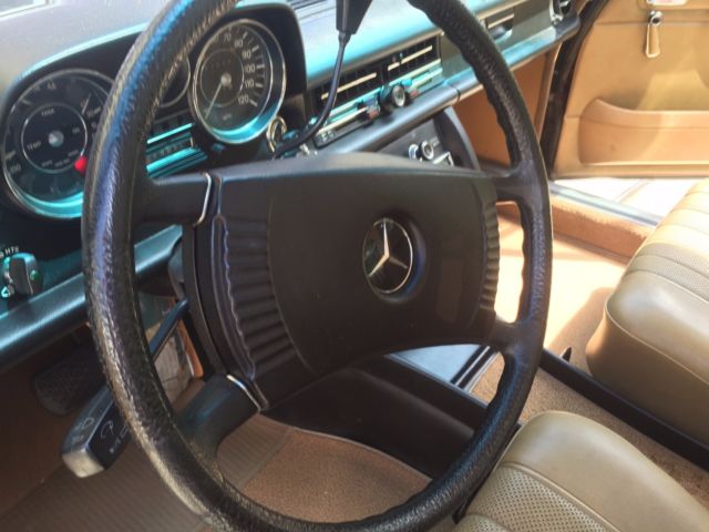 1973 Burgundy Mercedes-Benz 200-Series Sedan