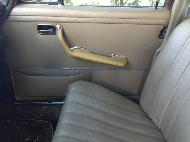 1973 Yellow Mercedes-Benz 200-Series Sedan