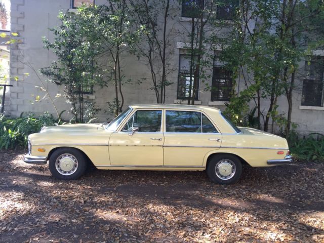1973 Yellow Mercedes-Benz 200-Series Sedan