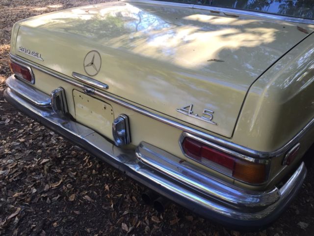 1973 Yellow Mercedes-Benz 200-Series Sedan