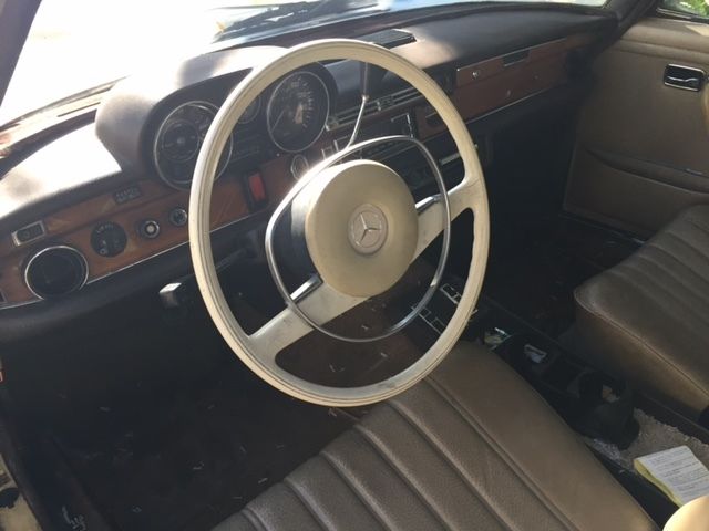 1973 Yellow Mercedes-Benz 200-Series Sedan