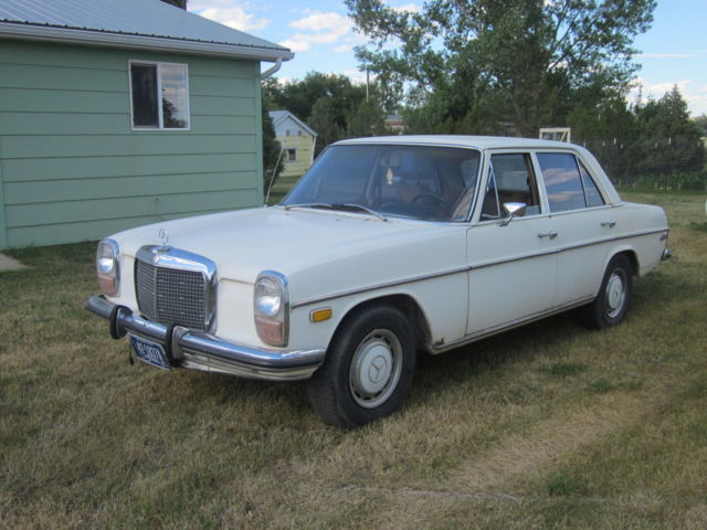 1973 White Mercedes-Benz 200-Series Sedan