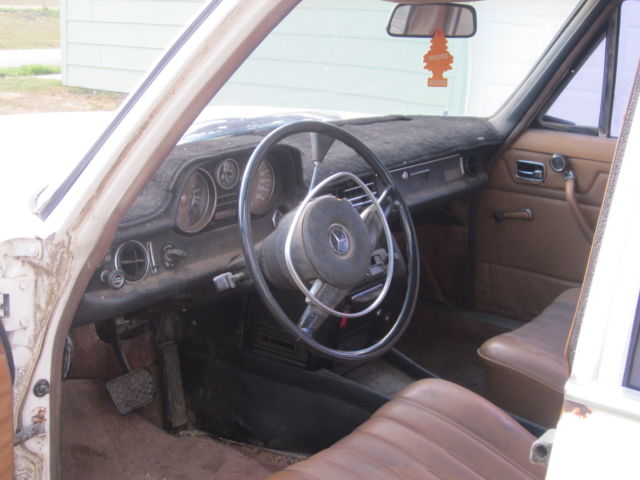 1973 White Mercedes-Benz 200-Series Sedan