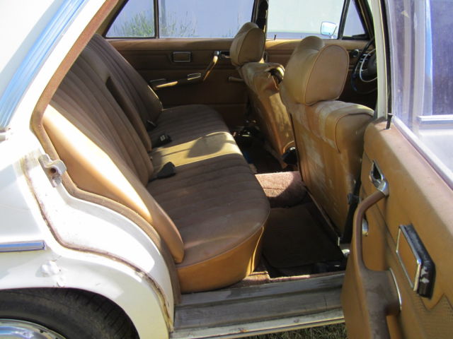 1973 White Mercedes-Benz 200-Series Sedan