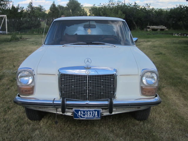 1973 White Mercedes-Benz 200-Series Sedan