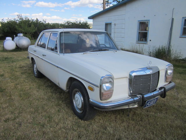 1973 White Mercedes-Benz 200-Series Sedan