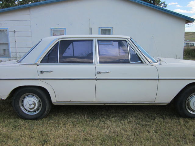 1973 White Mercedes-Benz 200-Series Sedan