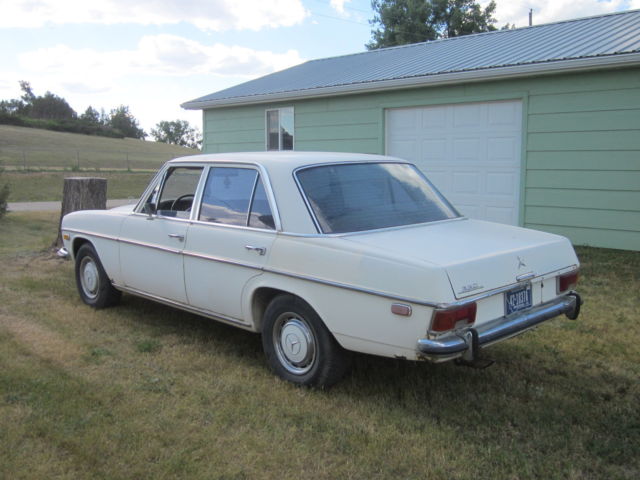1973 White Mercedes-Benz 200-Series Sedan
