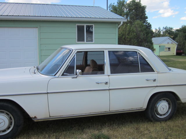1973 White Mercedes-Benz 200-Series Sedan