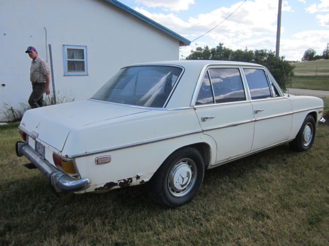 1973 White Mercedes-Benz 200-Series Sedan