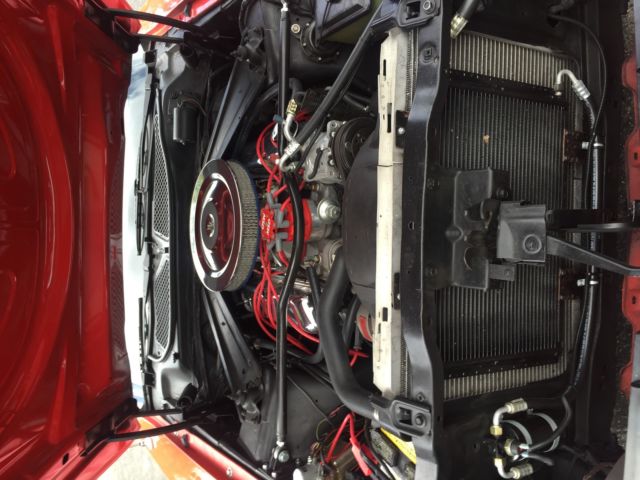 1973 red Ford Mustang Convertible