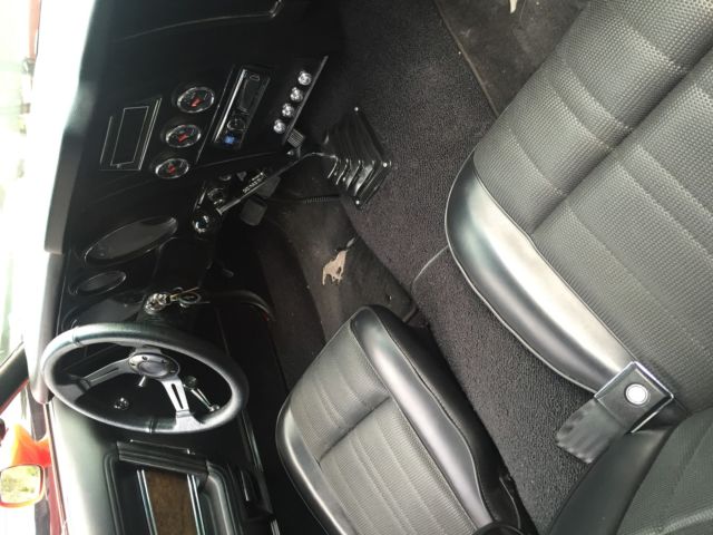 1973 red Ford Mustang Convertible