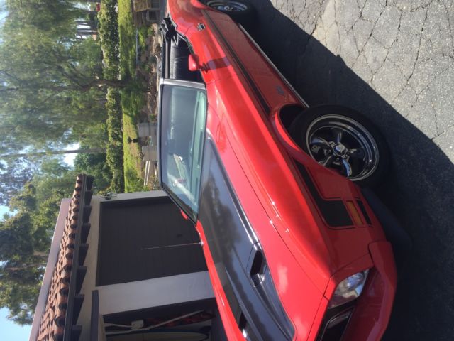 1973 red Ford Mustang Convertible