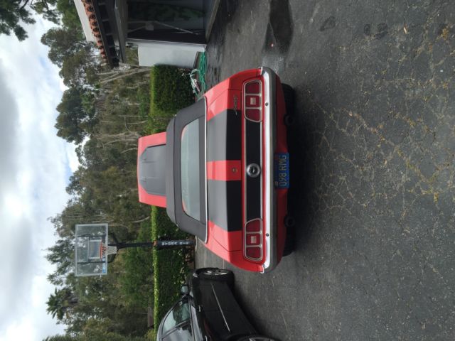 1973 red Ford Mustang Convertible