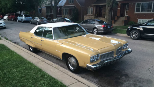 1973 Red Oldsmobile Ninety-Eight Sedan