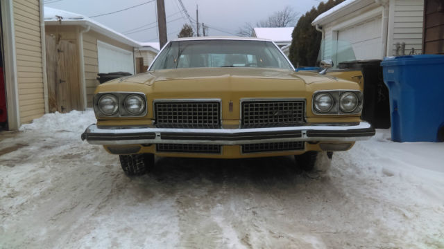 1973 Red Oldsmobile Ninety-Eight Sedan