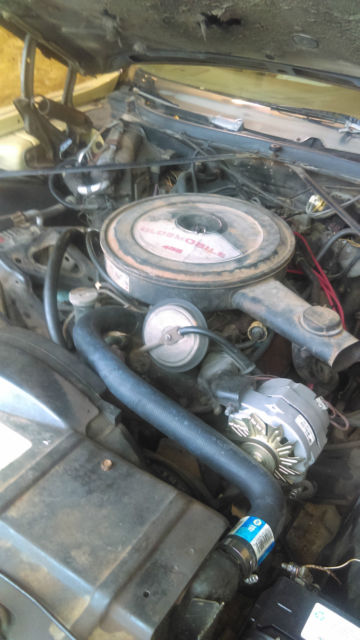 1973 Red Oldsmobile Ninety-Eight Sedan