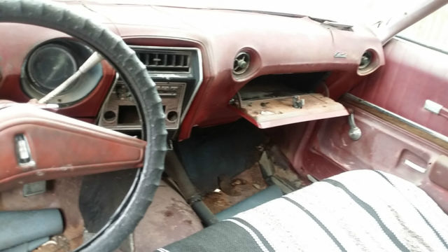 1973 Burgundy Oldsmobile Cutlass Coupe