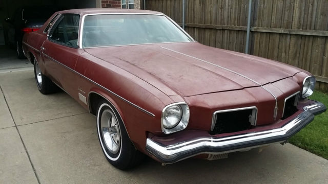 1973 Burgundy Oldsmobile Cutlass Coupe
