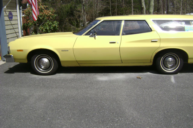 1973 Yellow Ford Torino station wagon