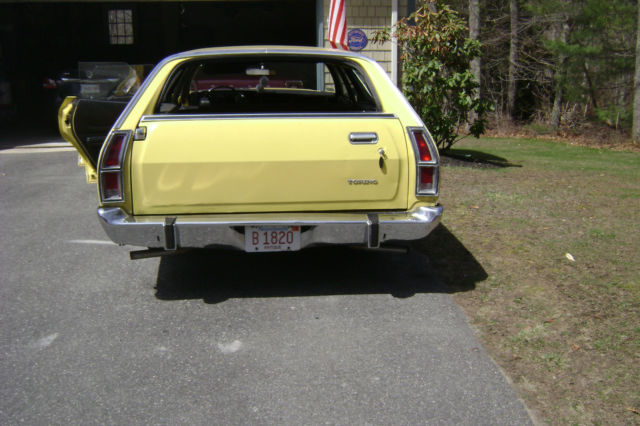 1973 Yellow Ford Torino station wagon
