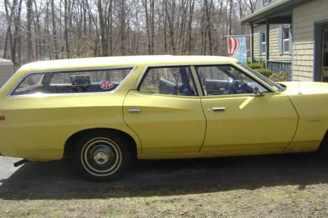 1973 Yellow Ford Torino station wagon