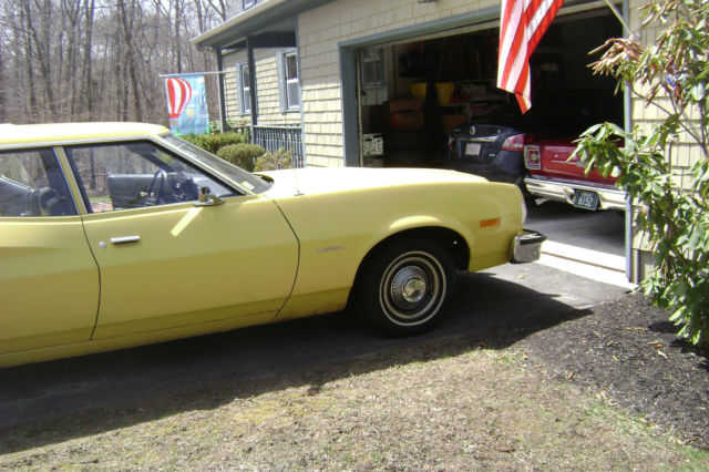 1973 Yellow Ford Torino station wagon
