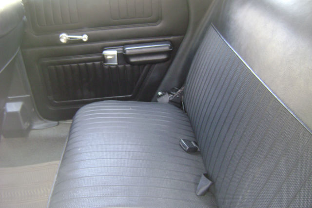 1973 Yellow Ford Torino station wagon