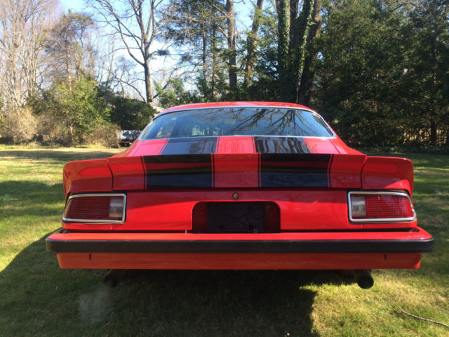 1974 red Chevrolet Camaro