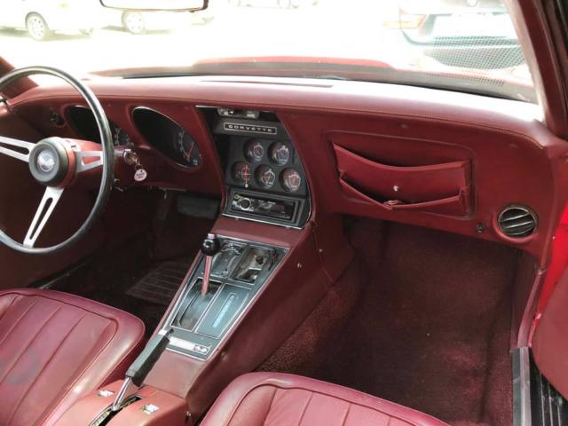 1974 red Chevrolet Corvette