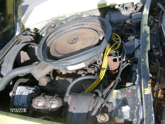 1974 yellow Chevrolet Corvette 2 door coupe