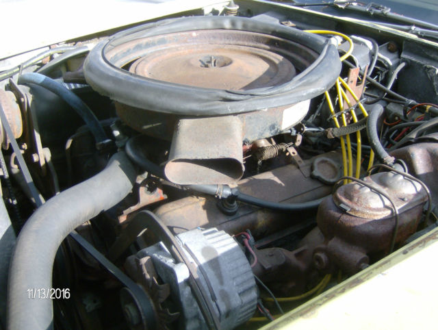1974 yellow Chevrolet Corvette 2 door coupe