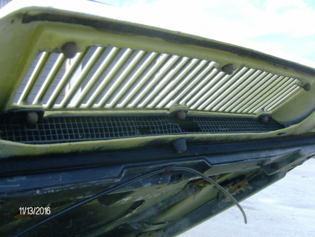 1974 yellow Chevrolet Corvette 2 door coupe