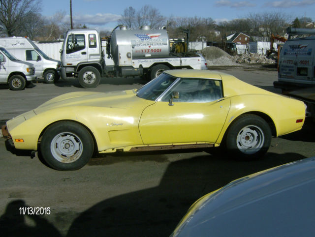1974 yellow Chevrolet Corvette 2 door coupe